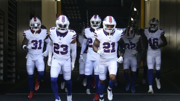 Aug 19, 2023; Pittsburgh, Pennsylvania, USA; The Buffalo Bills safties Dean Marlowe (31) and Micah Hyde (23) and Jordan Poyer (21) take the field to warm up before the game against the Pittsburgh Steelers at Acrisure Stadium.